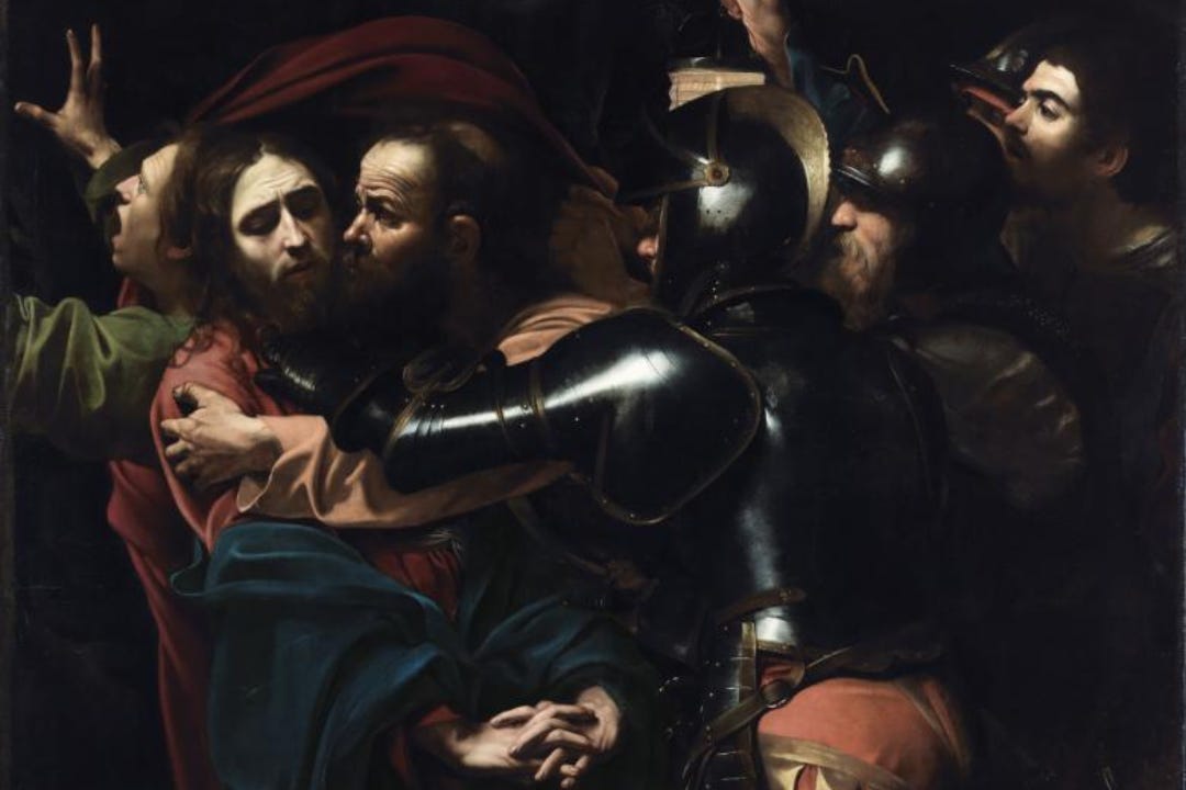 Caravaggio’s The Taking of Christ, soldiers in black armor seizing Christ as Judas kisses him, lit against a dark ground