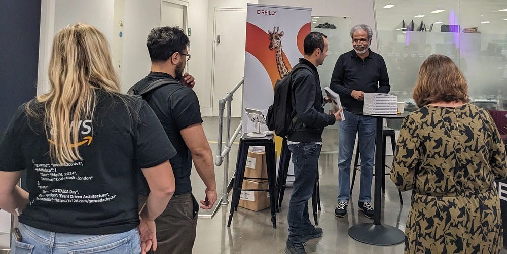 I’m chatting and signing books at GOTO Event-Driven Architecture Day, London, 2024.