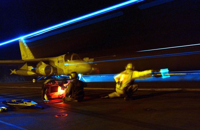 A group of men shooting a jet

AI-generated content may be incorrect.