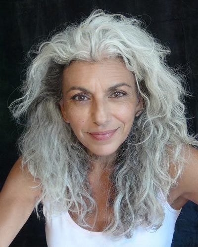 A person with long gray hair
AI-generated content may be incorrect. A person with long gray hair
AI-generated content may be incorrect.