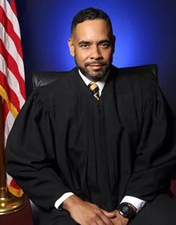 U.S. District Court Judge Carlos Eduardo Mendoza, a Barack Hussein Obama appointee
