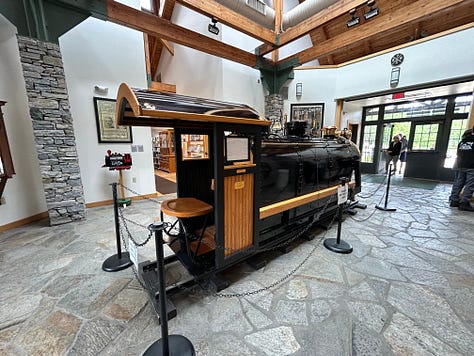 train, picnic tables, display, inside
