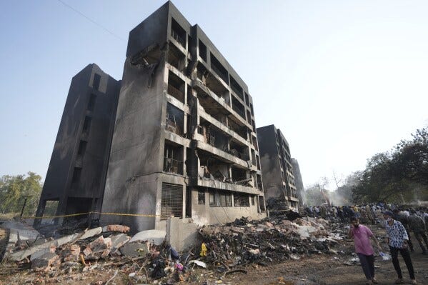 Search and rescue teams respond to the scene of a plane crash in Ahmedabad, India, Thursday, June 12, 2025. (AP Photo/Ajit Solanki) Search and rescue teams respond to the scene of a plane crash in Ahmedabad, India, Thursday, June 12, 2025. (AP Photo/Ajit Solanki)