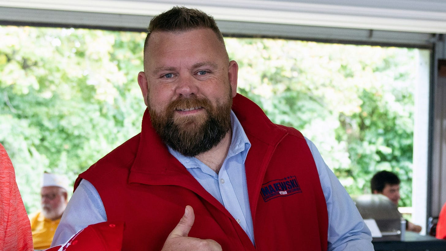UNITED STATES - AUGUST 20: Ohio Republican candidate for Congress J.R. Majewski speaks with veterans at the VFW Post 2529 Annual Corn Roast in Sandusky, Ohio on Saturday, August 20, 2022.