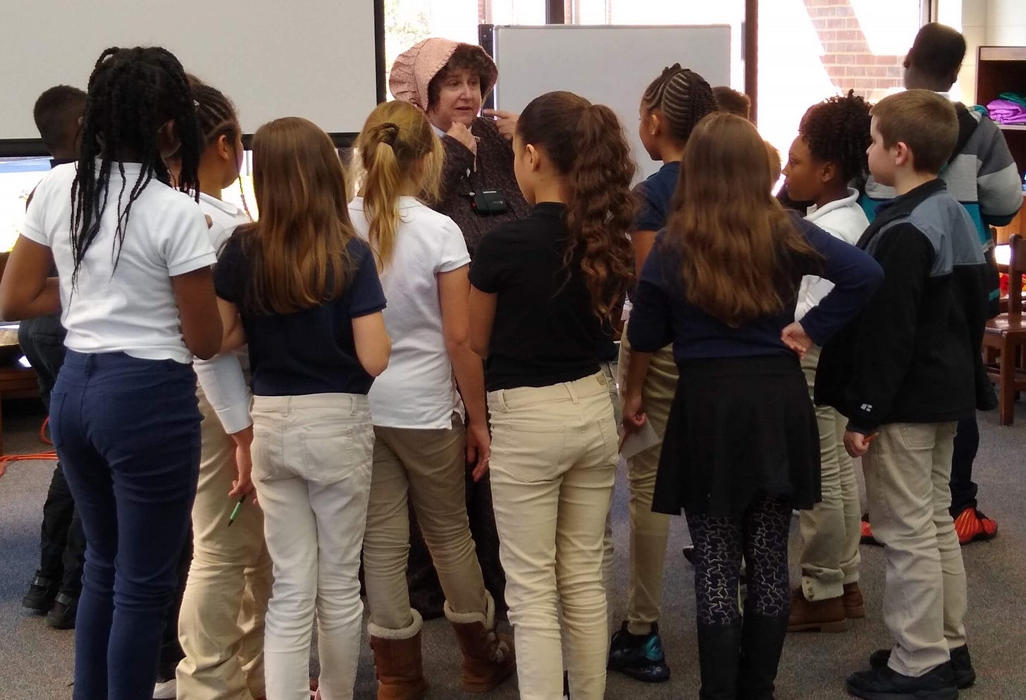 Annette surrounded by kids