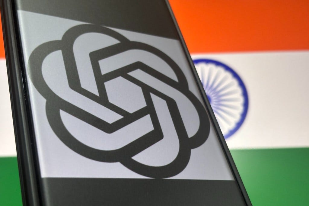 OpenAI logo over flag of India OpenAI logo over flag of India