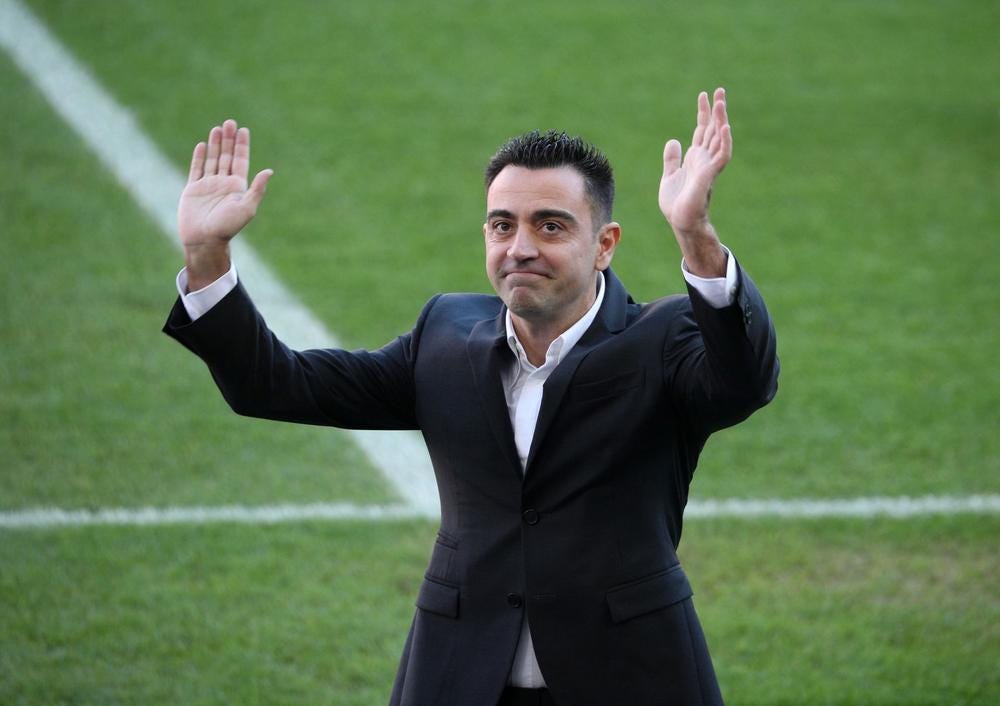 Xavi unveiled as Barcelona coach to fans at Camp Nou