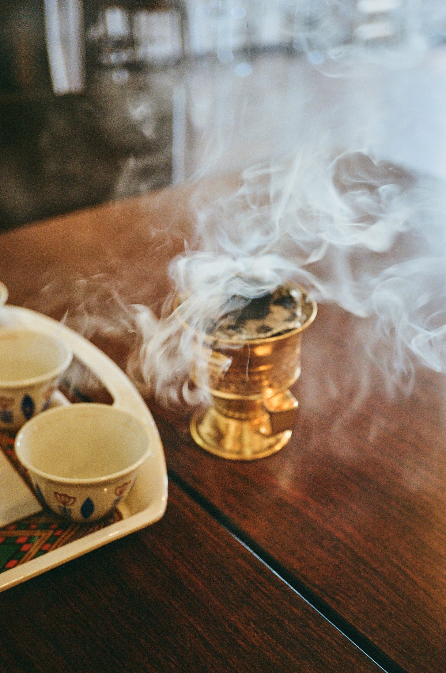 Burning incense as part of the coffee ceremony