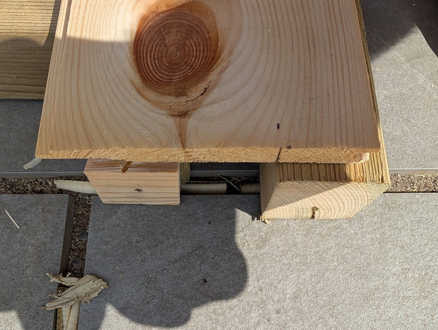 Jig for aligning first cladding piece on shed rear wall