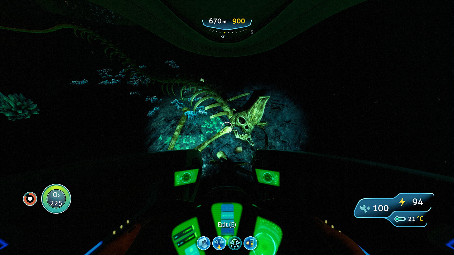 A screenshot of the game Subnautica showing a Reaper Leviathan fossil lying 670m deep on oceanic rock floor of planet 4546B, seen through the inside of the Seamoth vehicle HUD.