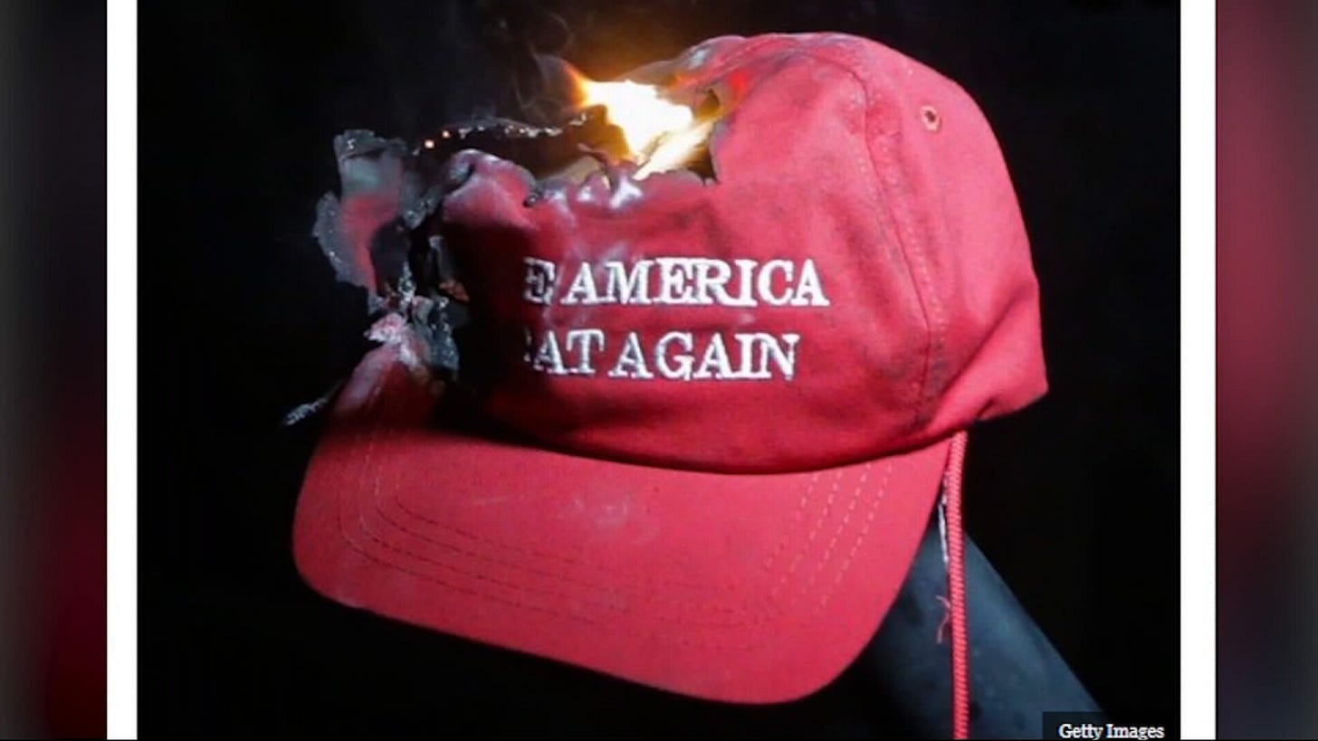 Breitbart: Trump voters burning MAGA hats