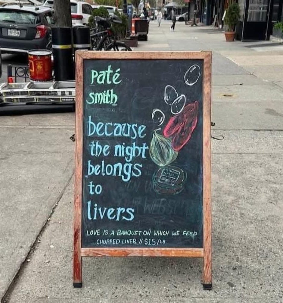 May be an image of 2 people, drink and text