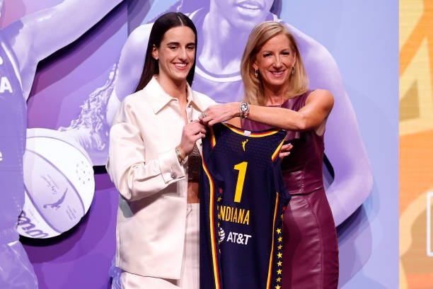 Caitlin Clark poses with WNBA Commissioner Cathy Engelbert after being selected first overall pick by the Indiana Fever during the 2024 WNBA Draft at...