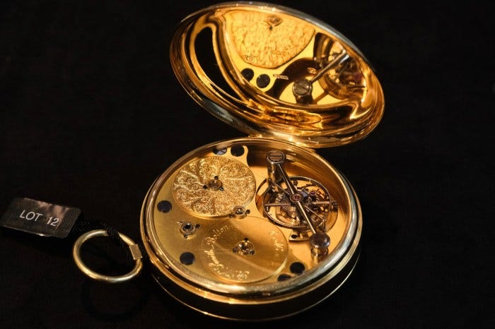 The opened caseback of Pocket Watch No. 2, showcasing the movement. Photo by Troy Barmore. The opened caseback of Pocket Watch No. 2, showcasing the movement. Photo by Troy Barmore.