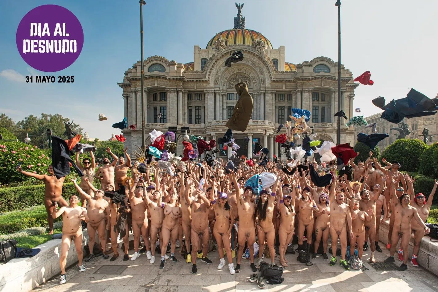Hundreds of naked participants in Mexico City’s Dia Al Desnudo throwing their clothes in the air on the steps of a city square.