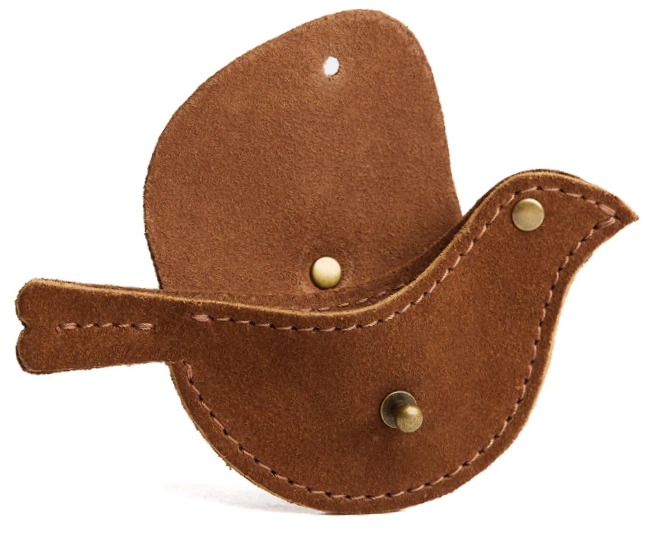 Pouch shaped like a bird with a wing that lifts up to reveal the opening