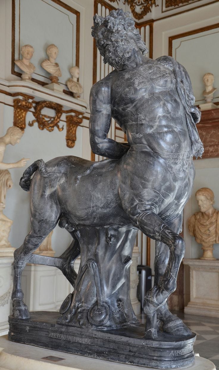 This may contain: a statue of a man riding on the back of a horse