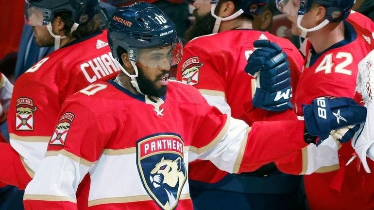 Panthers left wing Anthony Duclair celebrates his goal with the bench... Panthers left wing Anthony Duclair celebrates his goal with the bench...