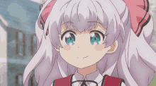 a girl with a pink bow on her head is smiling a girl with a pink bow on her head is smiling