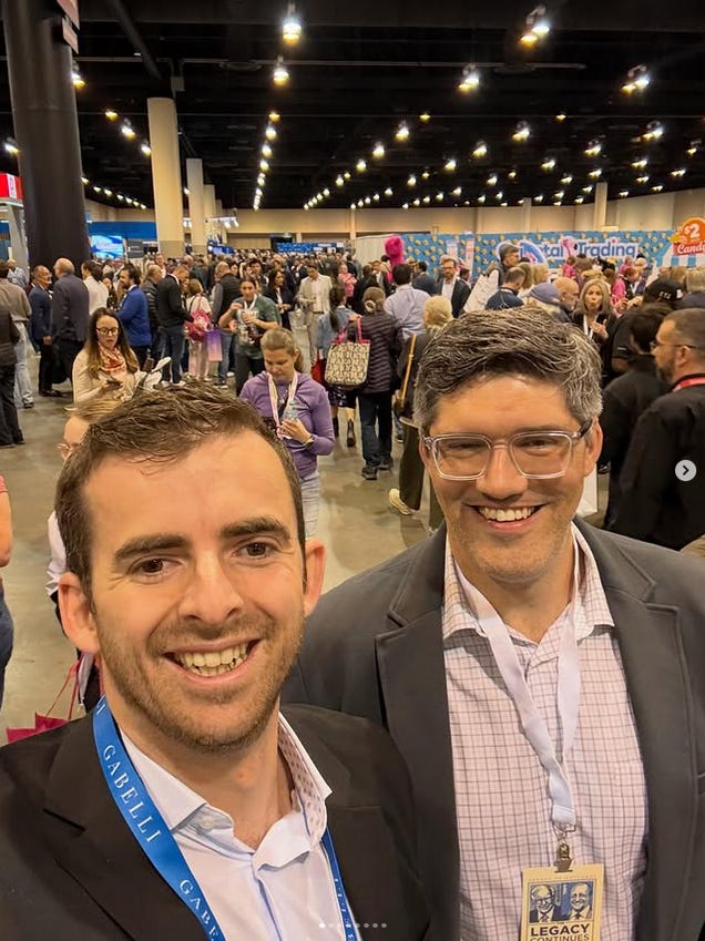 Two men taking a selfie in a large room

AI-generated content may be incorrect.