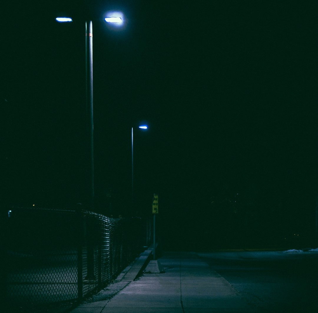 lighted street post at nighttime