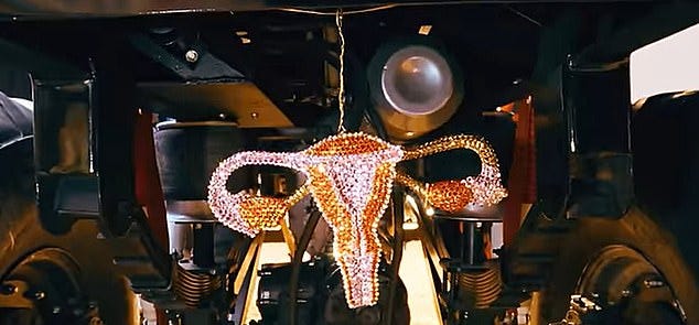 But some social media users were disappointed by Perry's inclusion of a uterus as one of the symbols of femininity, saying it was 'painfully cissexist' and exclusionary of trans women But some social media users were disappointed by Perry's inclusion of a uterus as one of the symbols of femininity, saying it was 'painfully cissexist' and exclusionary of trans women