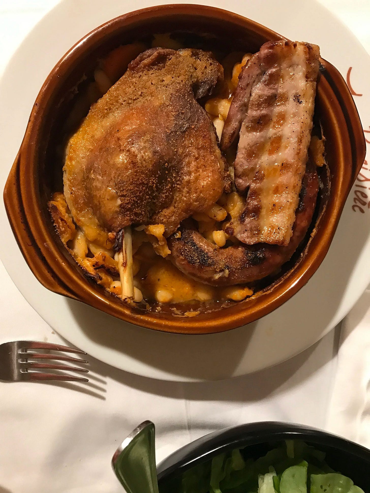  You simply cannot go to the southwest of France without eating this dish! Cassoulet from La Brasière, Restaurant in Toulouse, France. A lovely comfort dish of duck confit, bacon, sausage, and white beans.  