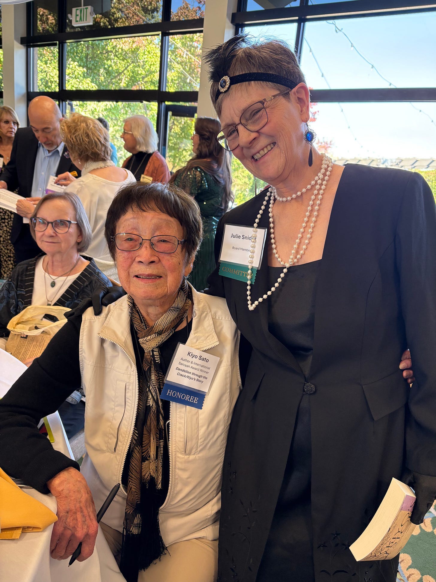 A person standing next to another person

AI-generated content may be incorrect.