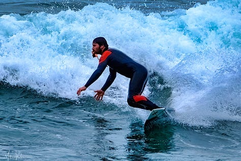 The Grande Plage and surfers