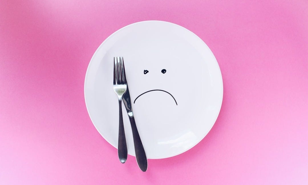 silver fork and knife on plate silver fork and knife on plate