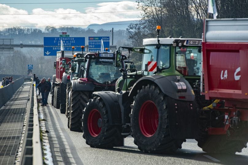 French farmers block the Hubert Touya viaduct on a highway Tuesday, 23 Jan, 2024 in Bayonne, southwestern France. French farmers block the Hubert Touya viaduct on a highway Tuesday, 23 Jan, 2024 in Bayonne, southwestern France.