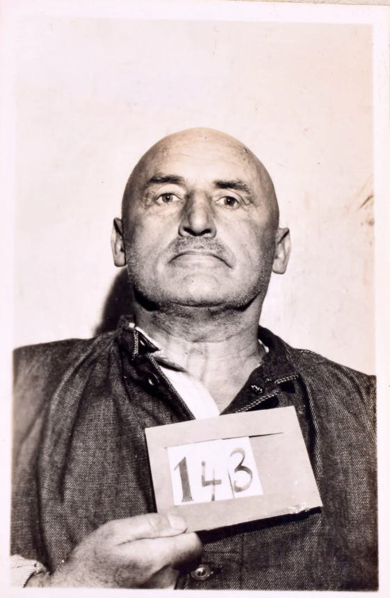 The booking photo of notorious Nazi propagandist Julius Streicher, publisher of 'Der Stürmer,' taken in Germany, 1945. Streicher was the first person convicted of inciting genocide, his incendiary rhetoric deemed an accomplice to murder.