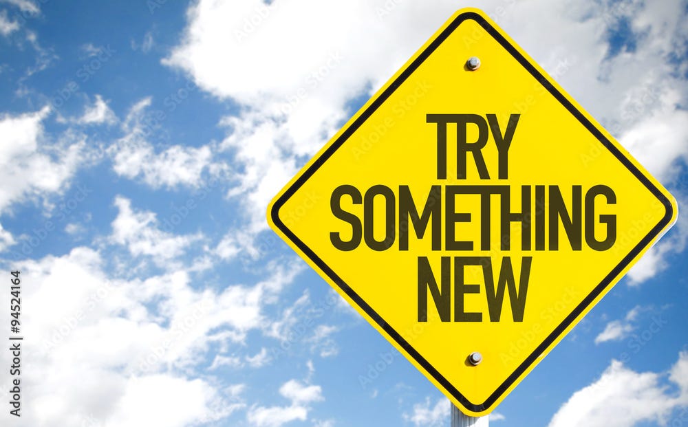 Try Something New sign with sky background Photos | Adobe Stock
