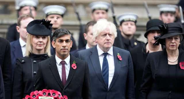 Liz Truss, Rishi Sunak, Boris Johnson and Theresa May at a remembrance day ceremony.