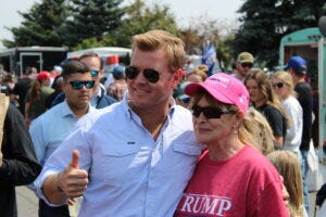 Tim Sheehy poses for photos with supporters outside of a rally in Bozeman featuring former President Donald Trump in Aug. 9, 2024. (Photo by Blair Miller, Daily Montanan) Tim Sheehy poses for photos with supporters outside of a rally in Bozeman featuring former President Donald Trump in Aug. 9, 2024. (Photo by Blair Miller, Daily Montanan)