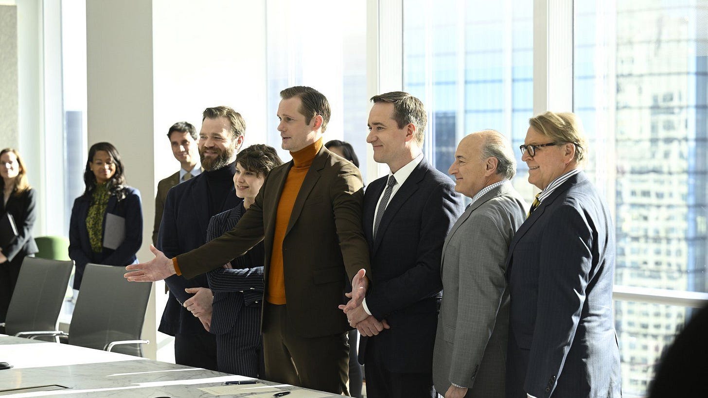 Executives standing around a boardroom table during a tense corporate meeting.