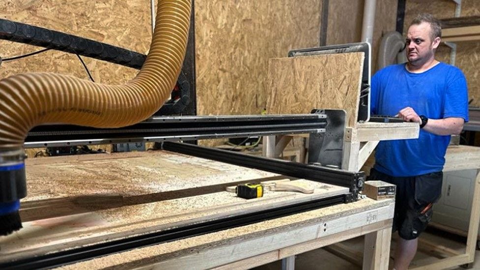 Dan working in his wood workshop Dan working in his wood workshop