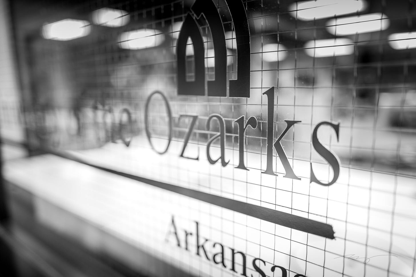 University of the Ozarks sign on window