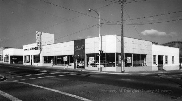Black and white photo f Hansen Motors in 1960, and a photo of the decaying facade today