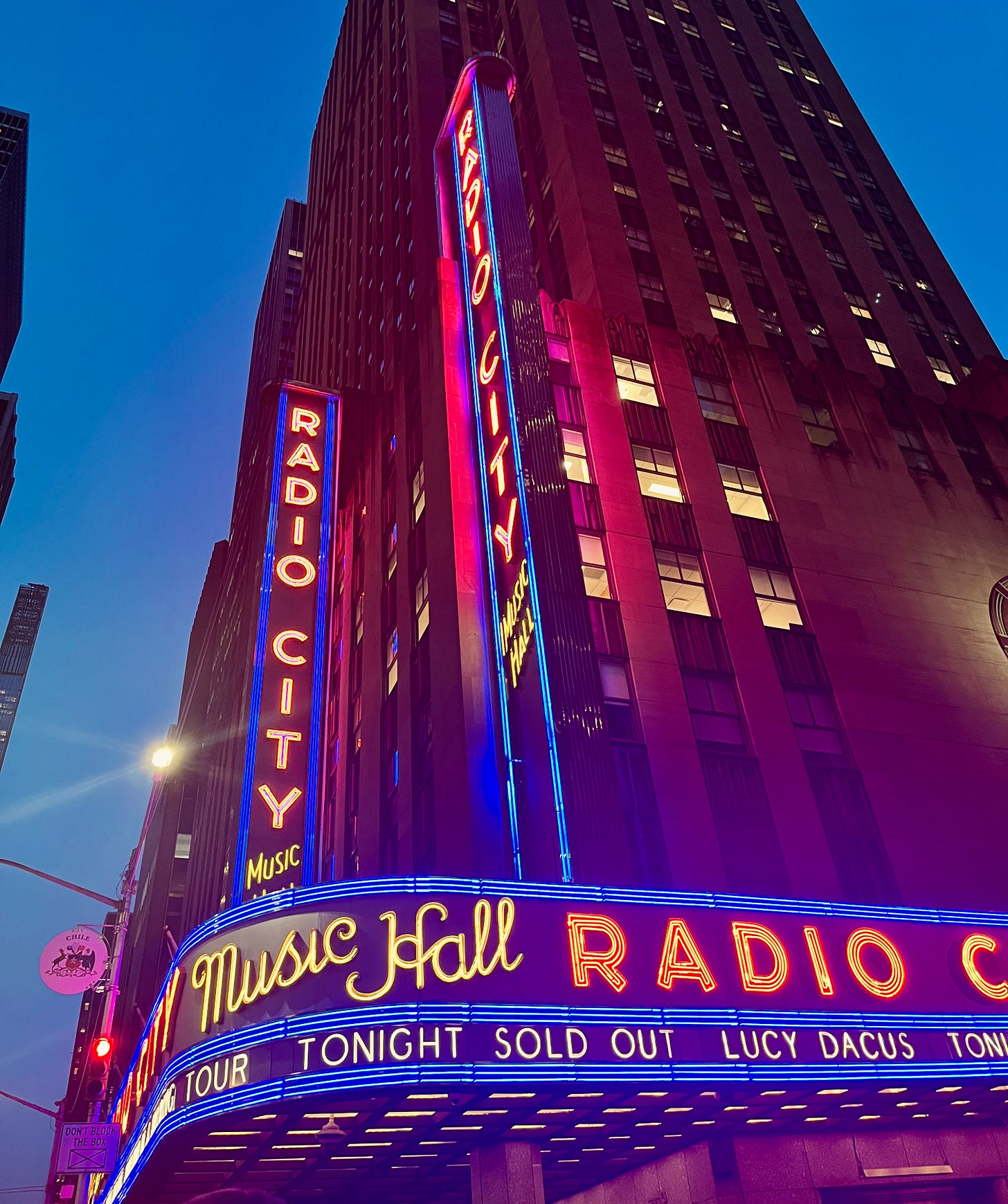 picture of the radio city music hall signs/lights with the marquee reading "Lucy Dacus Tonight Sold Out"