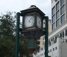 Sign commemorating novelist John D. MacDonald in 5 points