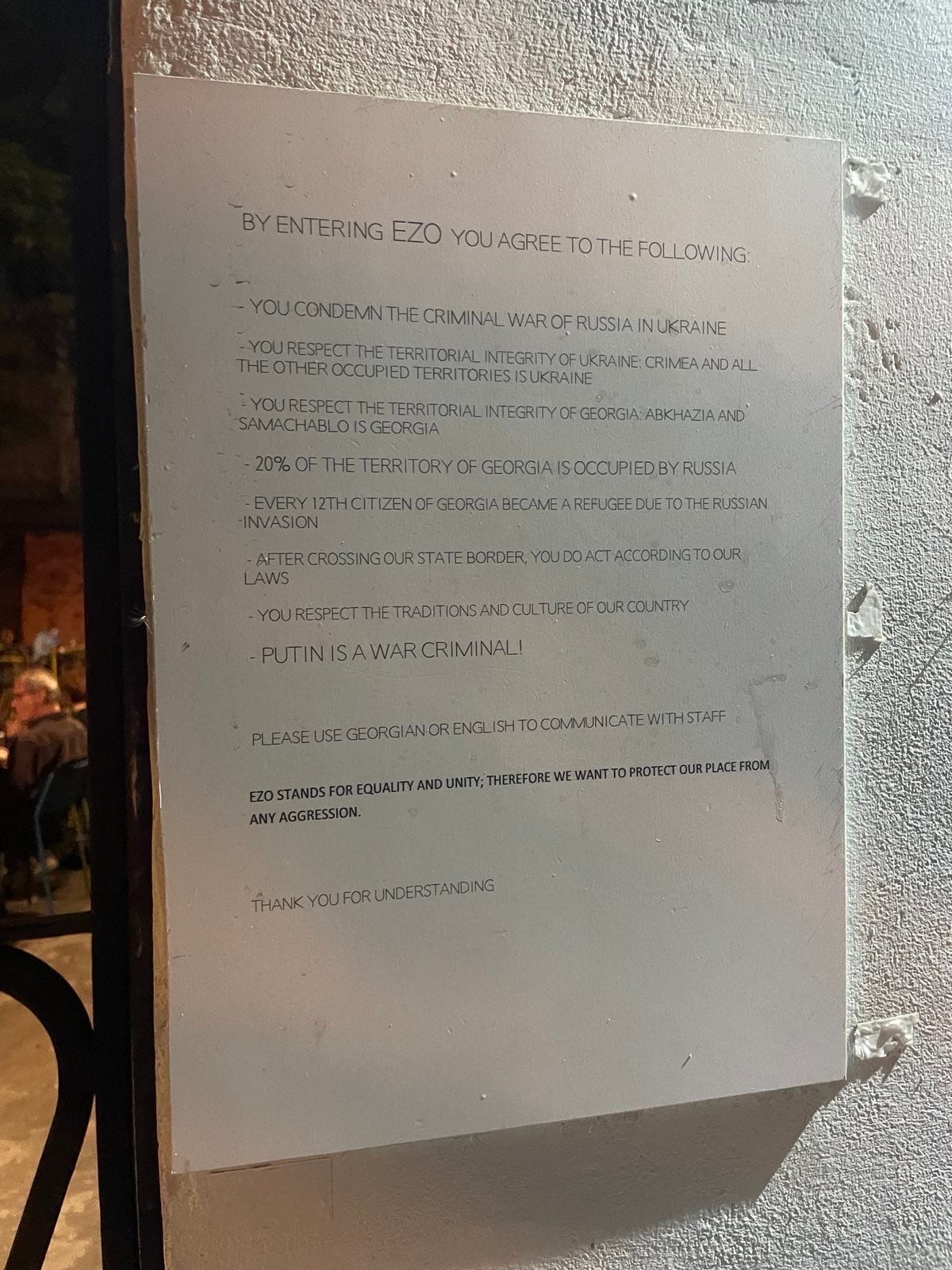 A sign on a wall

Description automatically generated