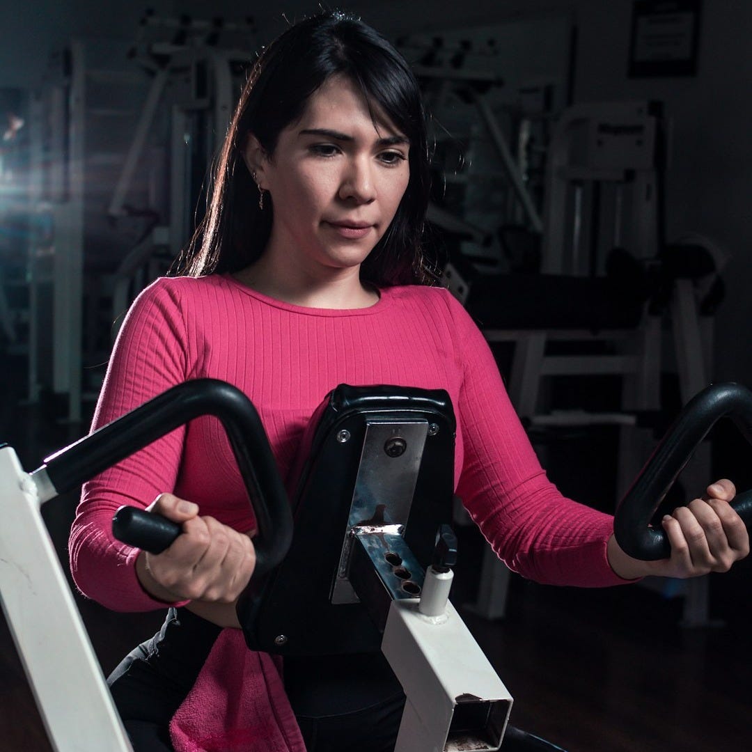 a person holding a pair of scissors