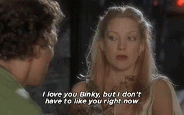a man and a woman are looking at each other and the woman is saying i love you binky