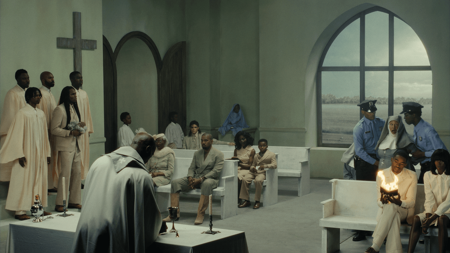 Image may contain Kanye West Denise Perrier Billie Thomas Indoors Room Waiting Room Couch Furniture and People