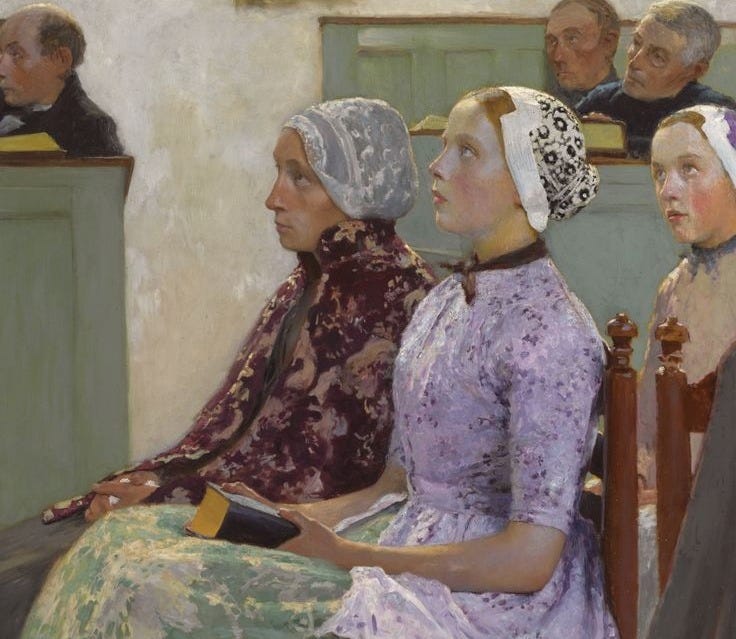 This may contain: two women sitting next to each other in front of a group of men and women