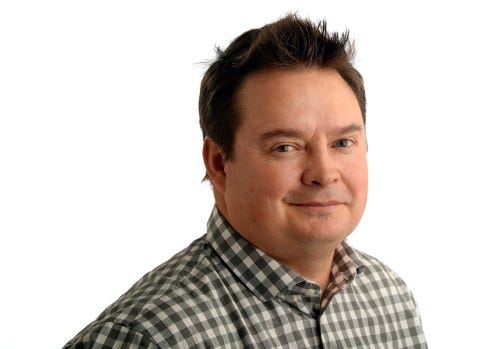 DENVER, CO - MARCH 3: The Denver Post sports reporter Troy Renck in the studio on Tuesday, March 3, 2015. (Photo by Cyrus McCrimmon/The Denver Post )