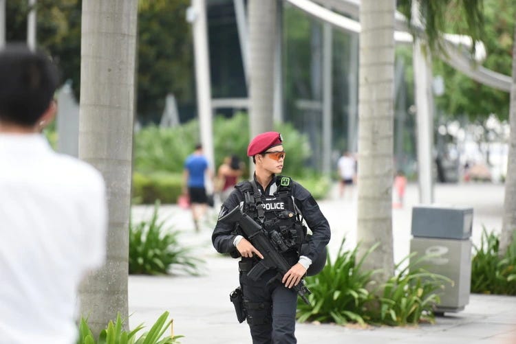 An armed police patrol in the city centre