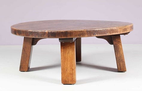 a green twisted bar stool, pair of art deco patchwork wood bedside tables, a chunky coffee table