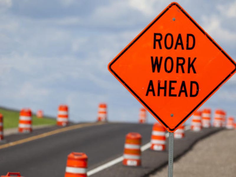 Image may contain: possible text that says 'ROAD WORK AHEAD R' Image may contain: possible text that says 'ROAD WORK AHEAD R'